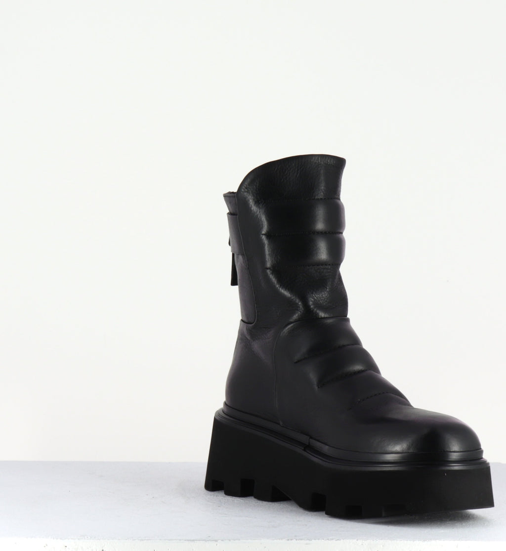 Boots en cuir noir à surpiqures et semelle micro - E2722