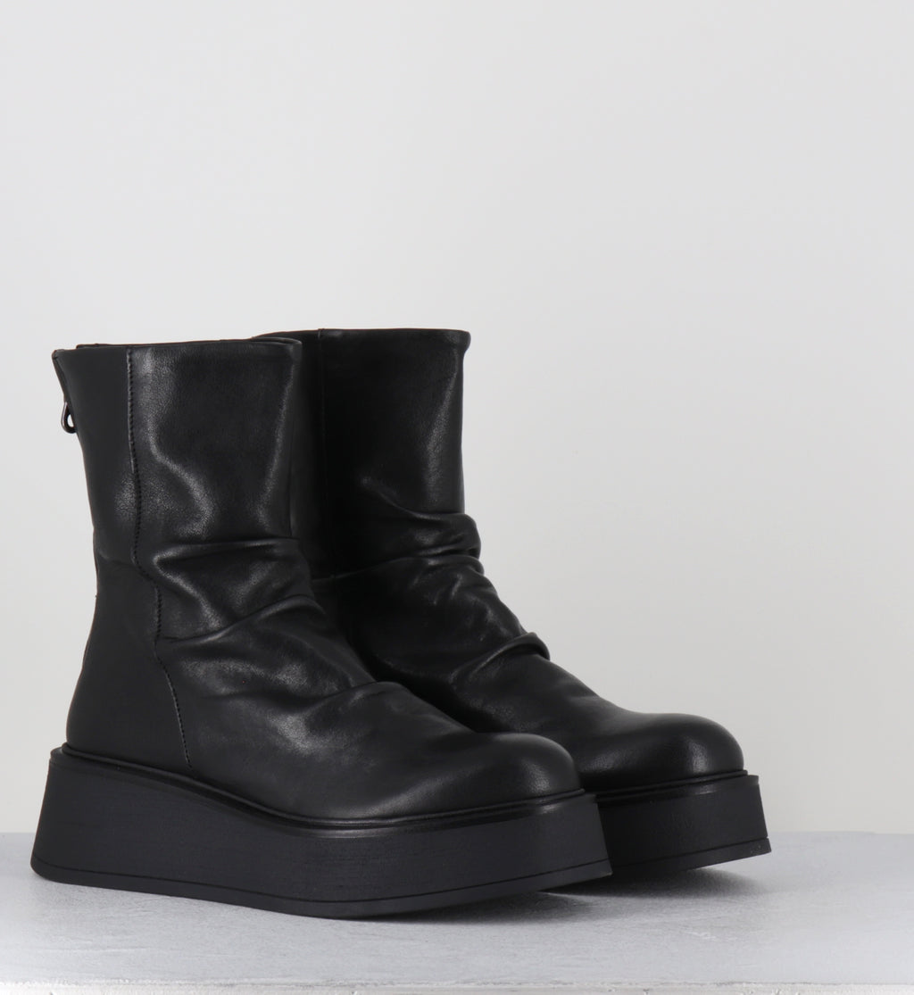 Bottines compensées en cuir noir - ROKAN LAVATO NERO